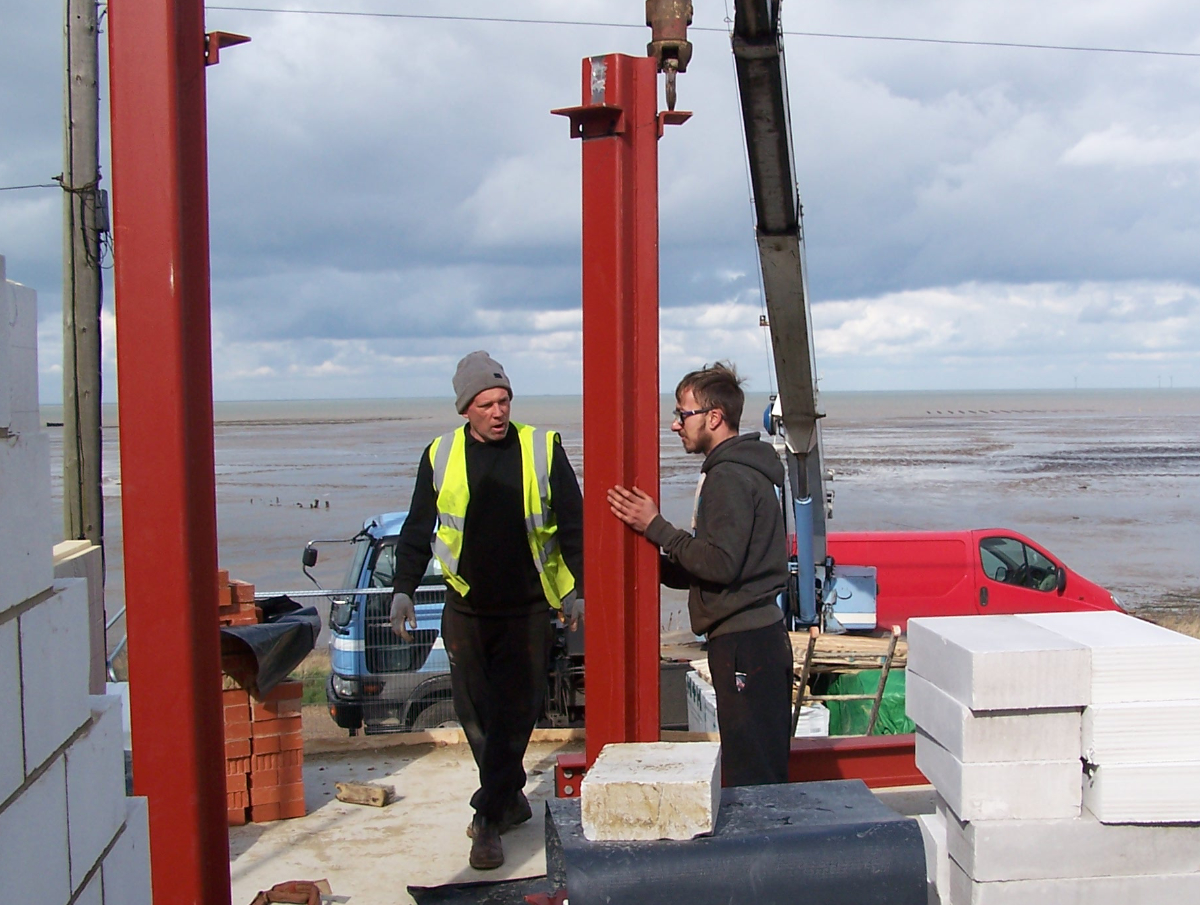 Construction, erection of front steel frame